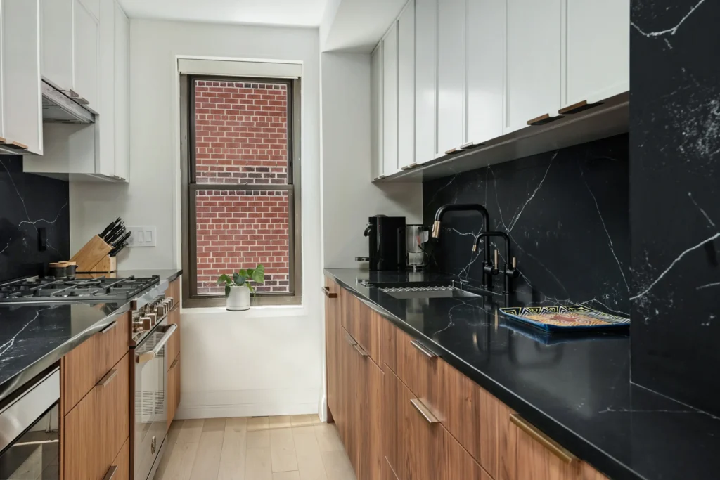 Mid century design kitchen walnut and marble black counters