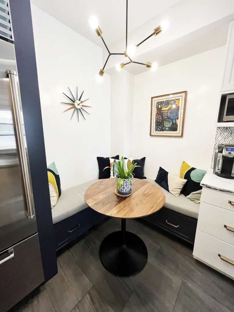 Custom kitchen white cabinet with walnut table corner nook