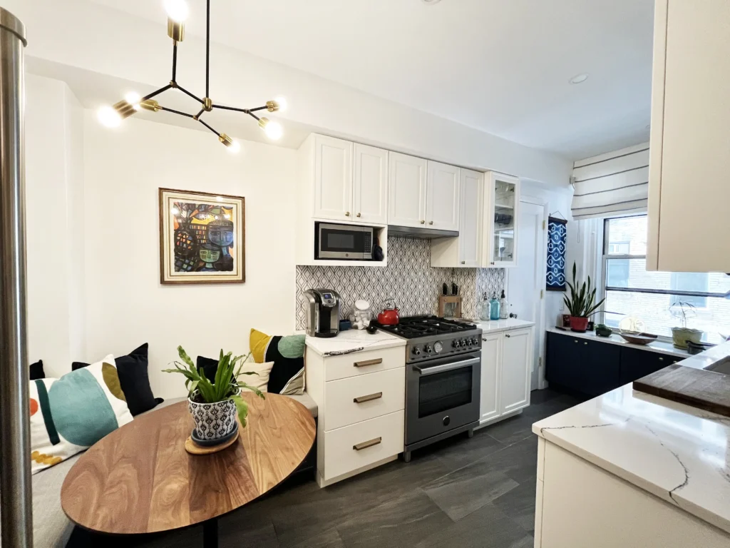 Custom kitchen white cabinet with walnut table corner nook