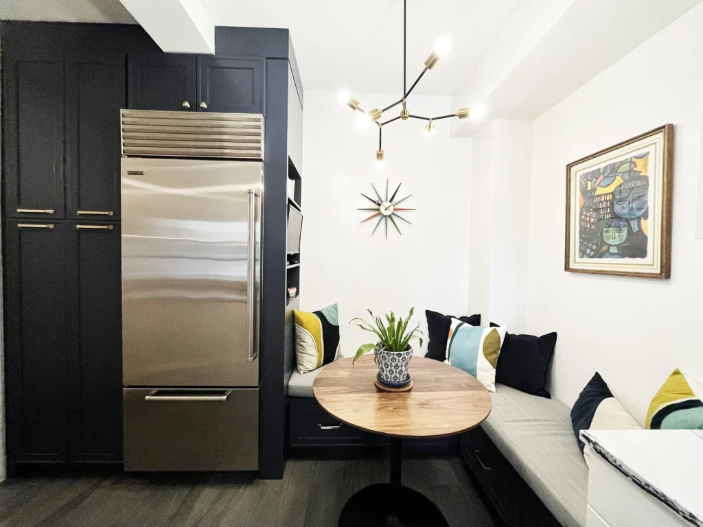 Custom kitchen white cabinet with walnut table corner nook