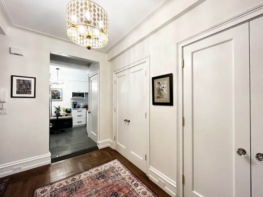 Custom kitchen white cabinet with walnut table corner nook