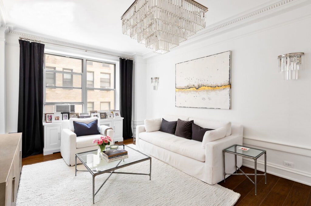 All white living room black accents - chandeliers